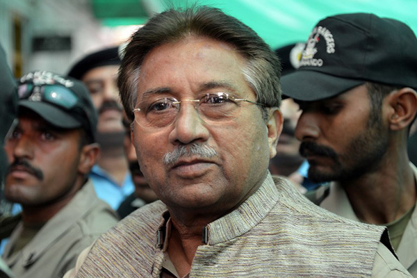 Former President Pervez Musharraf is escorted by soldiers, April 2013. Aamir Qureshi—AFP