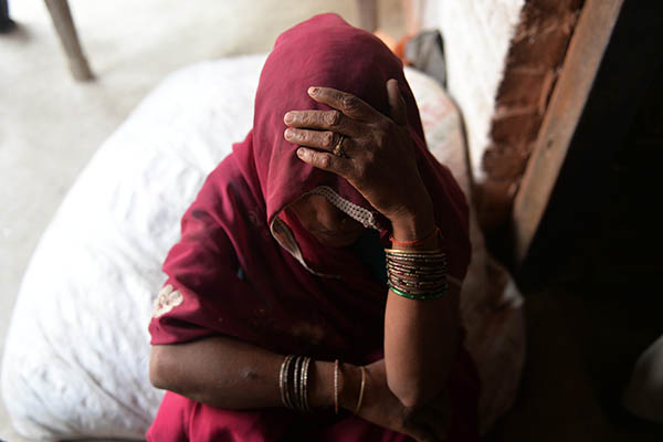 The mother of one of the girls gang-raped and hanged to death in Uttar Pradesh state. Chandan Khanna—AFP