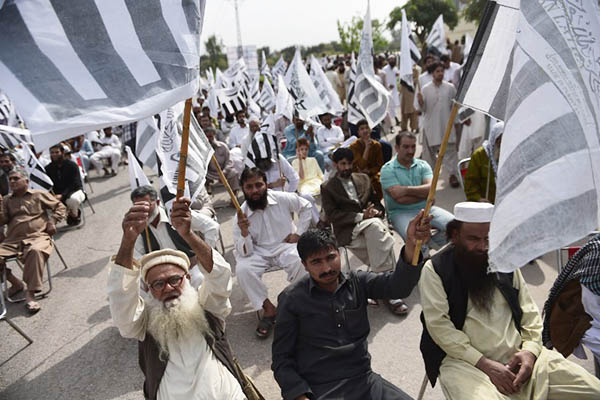 Jamaat-ud-Dawah activists demonstrate in favor of the Saudi-led coalition in Islamabad. Farooq Naeem—AFP