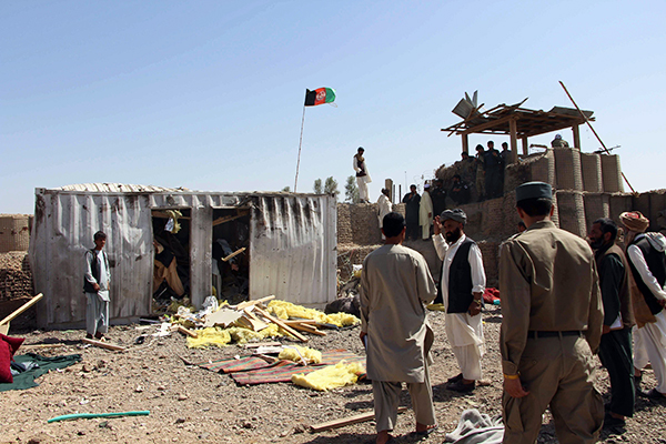 Site of a suicide car-bombing near a police-training base in Helmand, May 14. Noor Mohammad—AFP